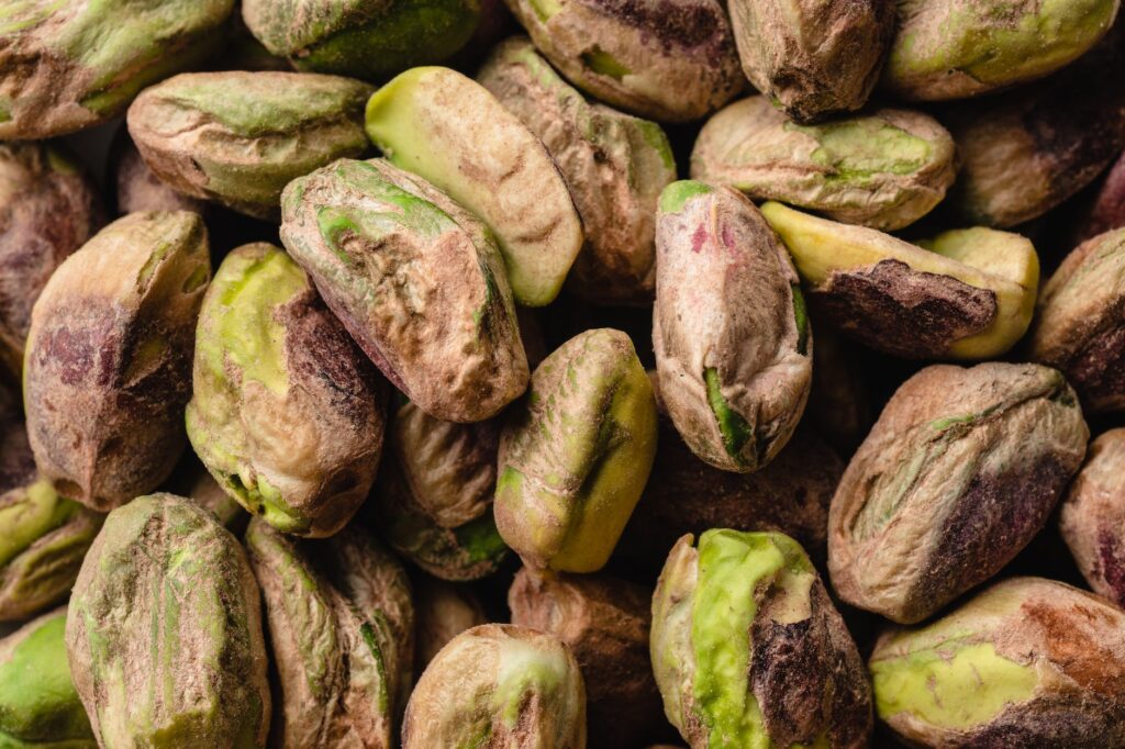 green and brown pistachio nuts